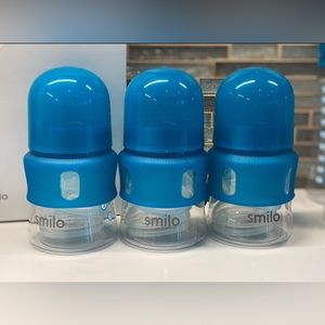 Blue, gently used Smilo 5oz bottle set